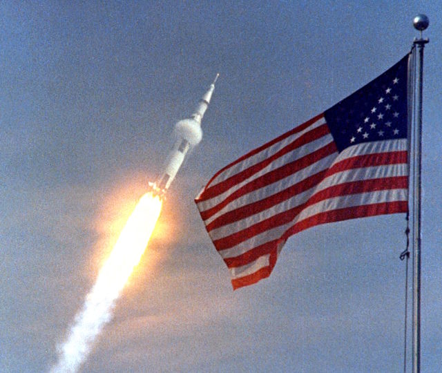 HDforums-Apollo-11-Saturn-V-rocket-launch-Condensation-cloud-Mach1-American-flag-flying-astronauts-Neil-Armstrong-Michael-Collins-Buzz-Aldrin-16th-July-1969-Kennedy-Space-Center-Nasa-photo