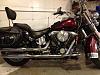 Show me your Softail Deluxe Passenger footpeg mounts.-exhaust.jpg