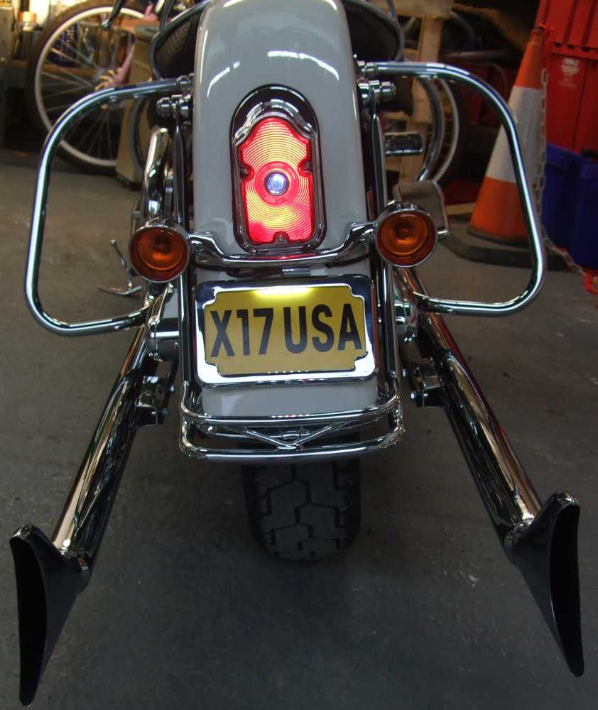 deluxe tombstone taillight plate mount light. 