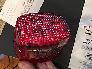Bright Ass Taillight with top window for license plate-ab576f61-3e44-49d2-999b-c9bfa468f29f.jpeg