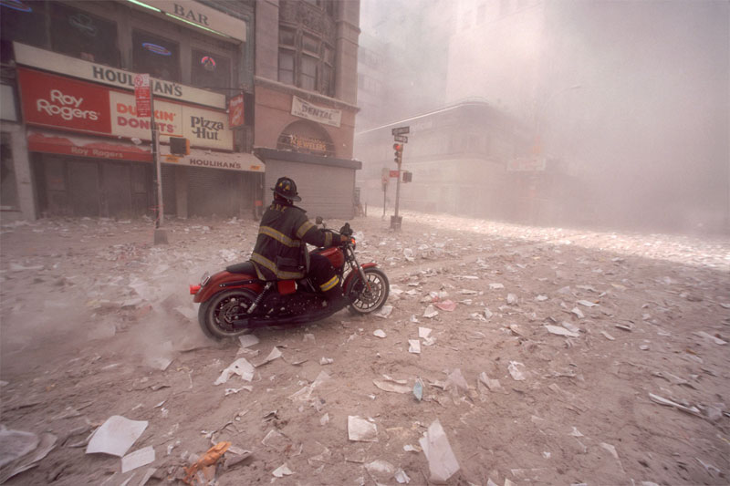 Photo of Firefighter Arriving at World Trade Center on 9/11 on a Harley-Davidson