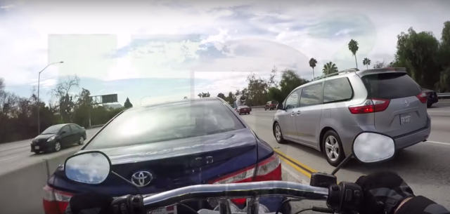 GOING VIRAL: Harley Rider Schools Car-Driving Idiot (Video)
