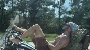 Biker is One Easy Rider While Catching Some Rays
