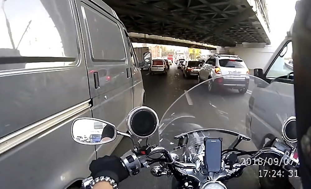 Awesome, Earth-conscious Motorcyclist Gets Instant Revenge On Litterbug